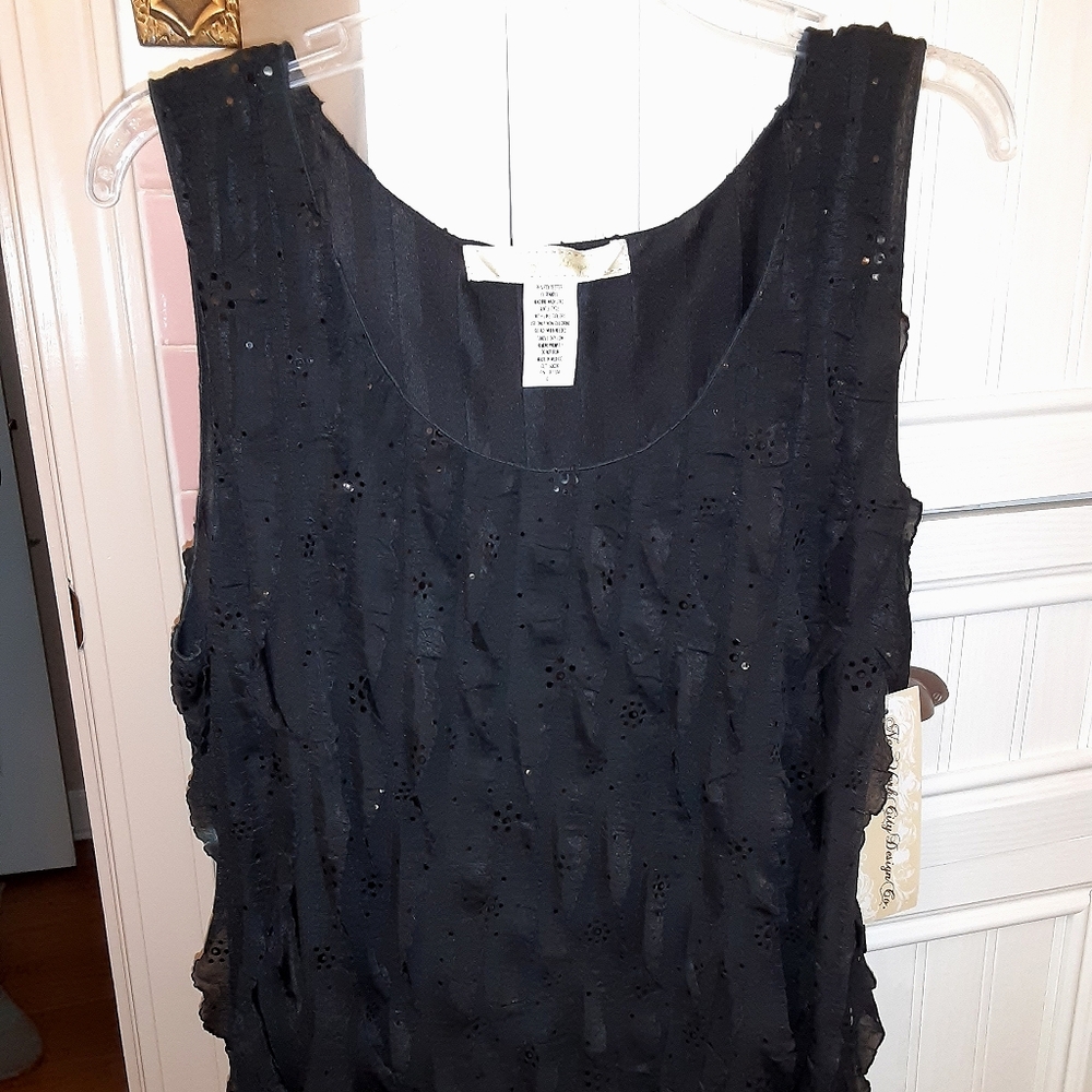 Black sleeveless top with sequins